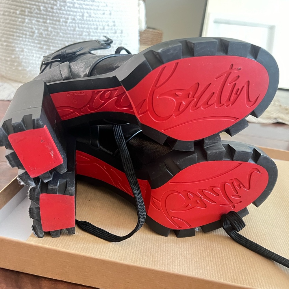 CHRISTIAN LOUBOUTIN  worn a couple of times. 
Black Macademia Ankle Boots